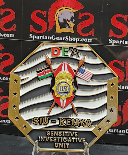 10 LEFT: DEA NAIROBI SENSITIVE INVESTIGATIVE UNIT "ONE BITE" COIN